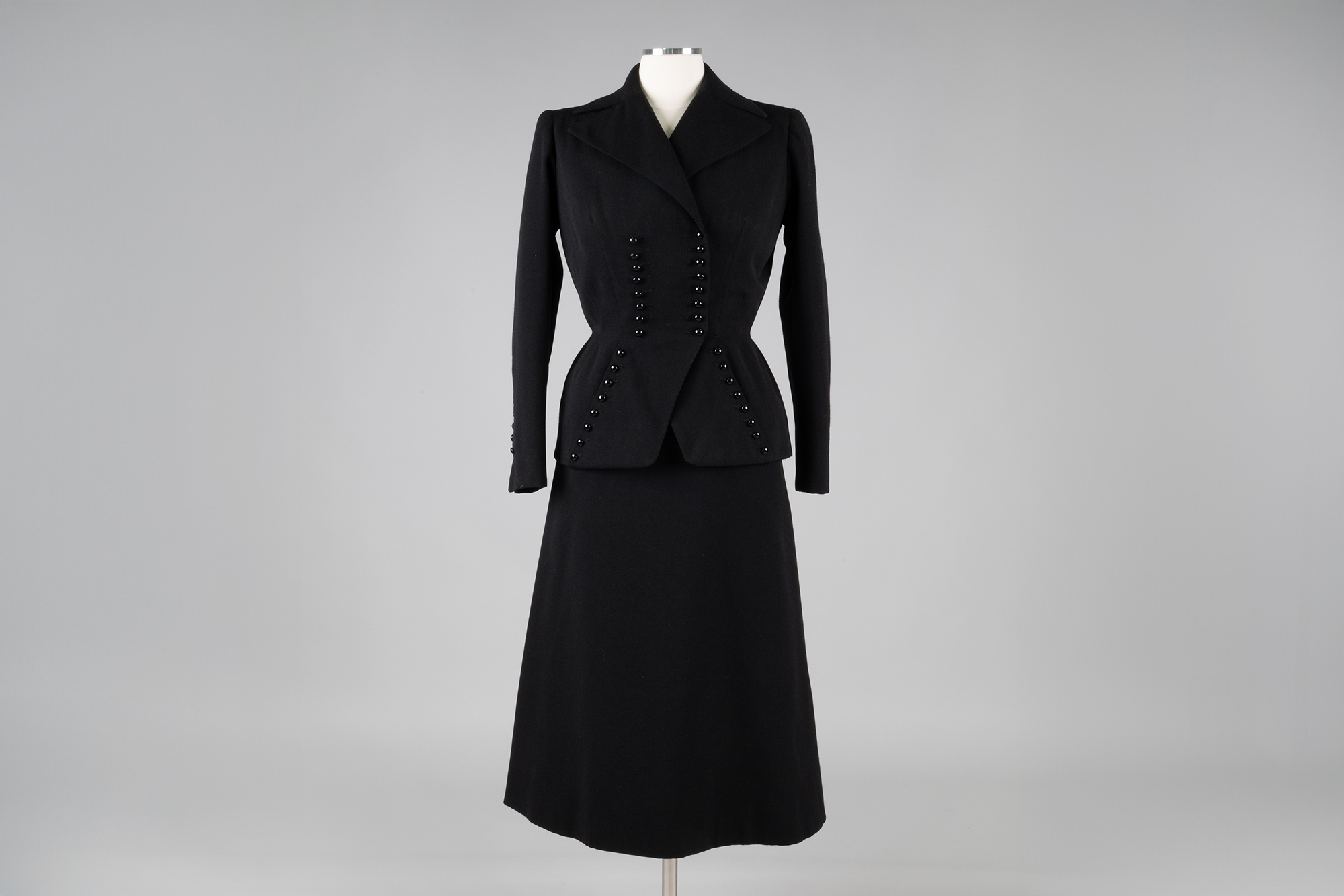 Image of Black faille skirt suit, 1951